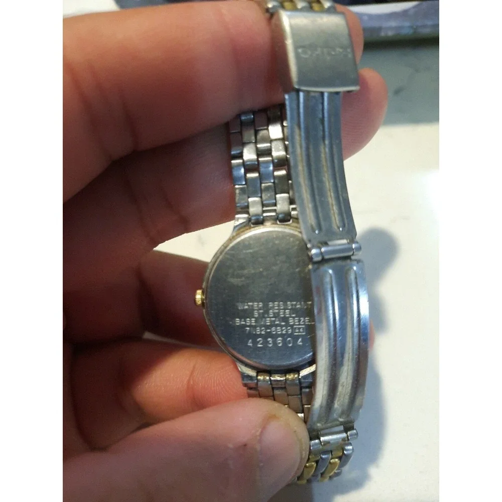 Seiko Watch Women 24mm White Dial Two Tone Date Round 7N82-6B29